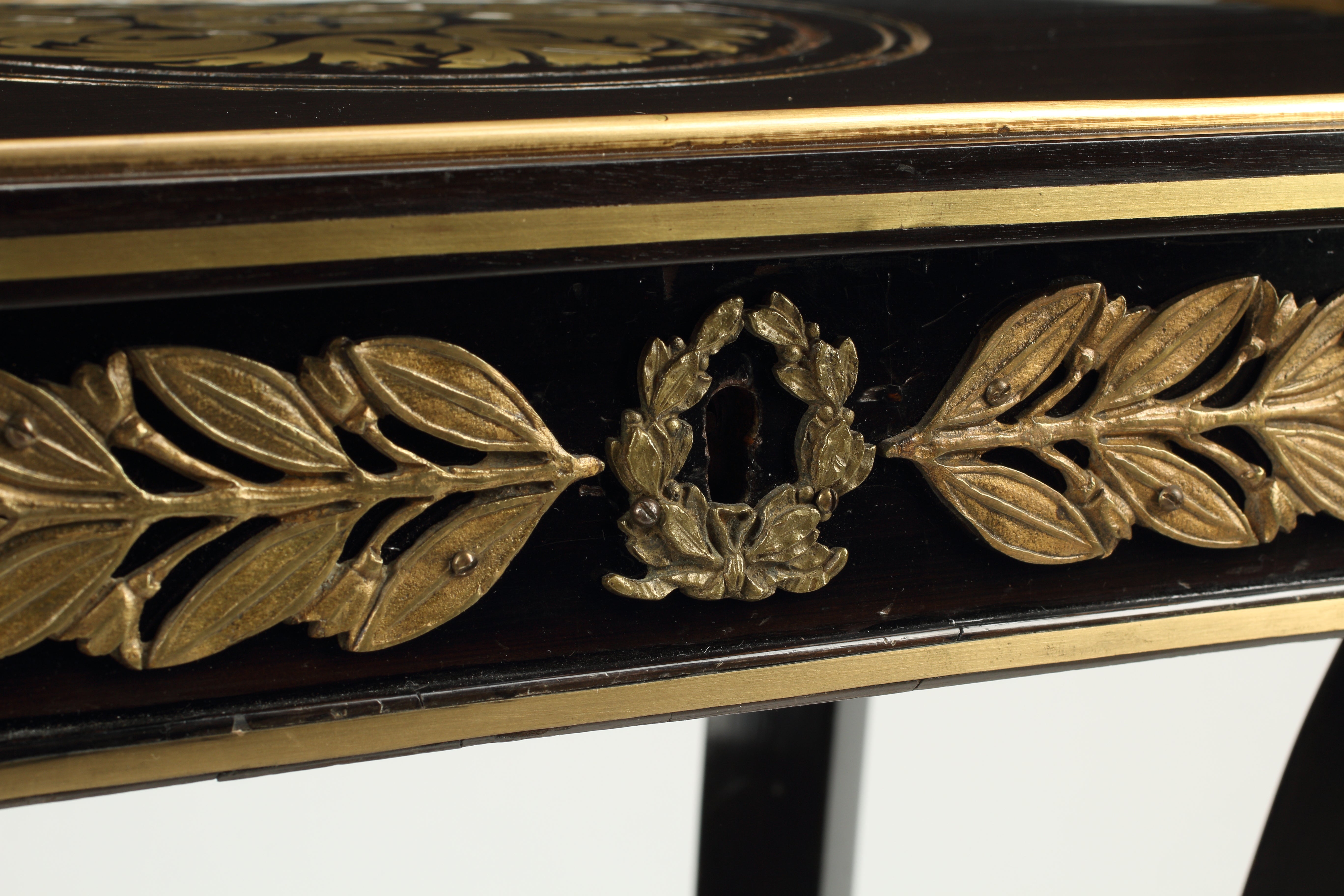 Napoleon III Parcel Gilt Ebony Veneered Side Table